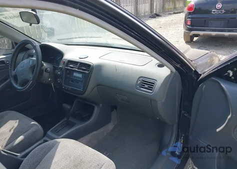 1999 Honda Civic Lx from USA, damaged, VIN 1HGEJ6672XH552777